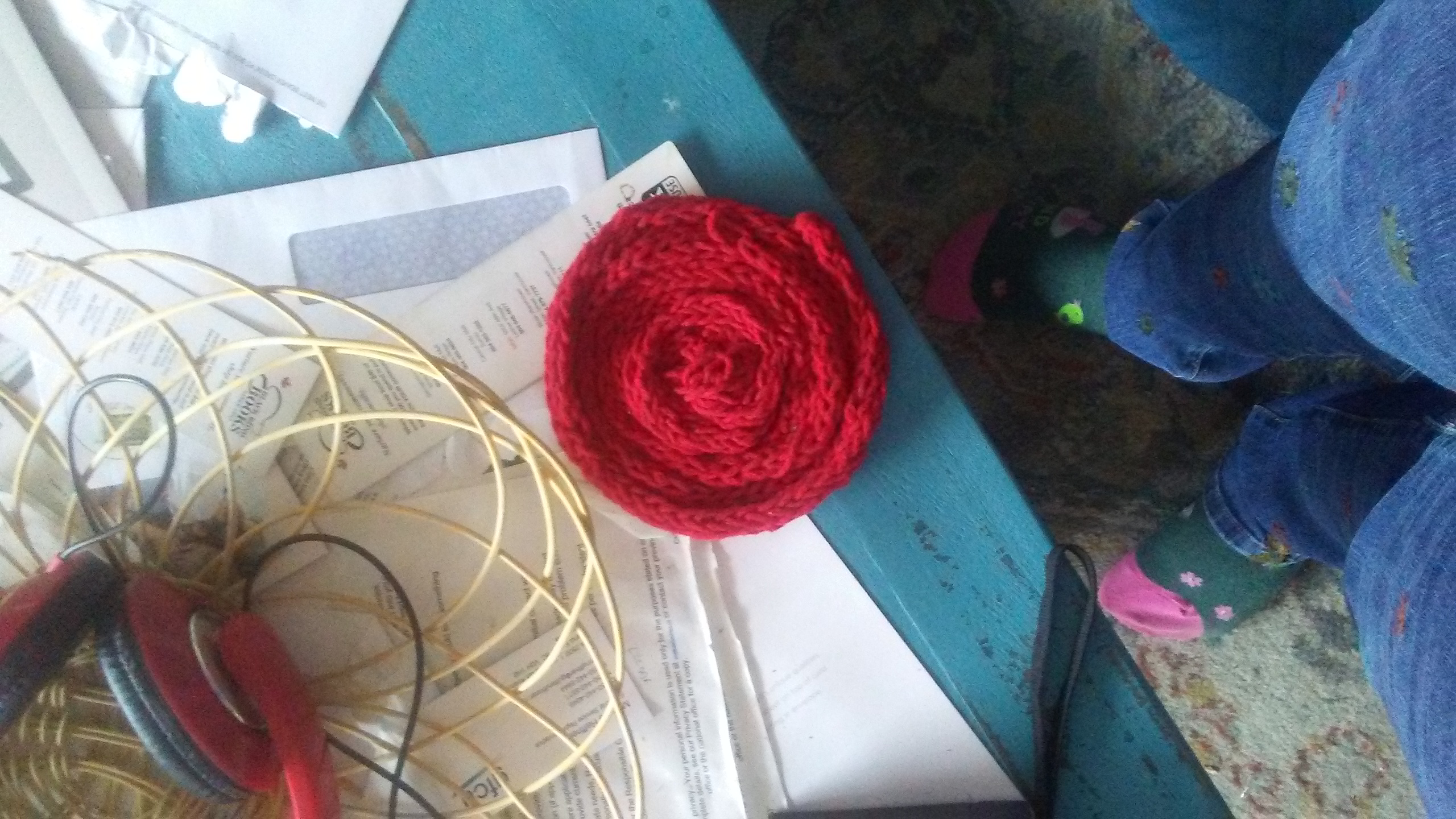 picture of a knitted red coaster